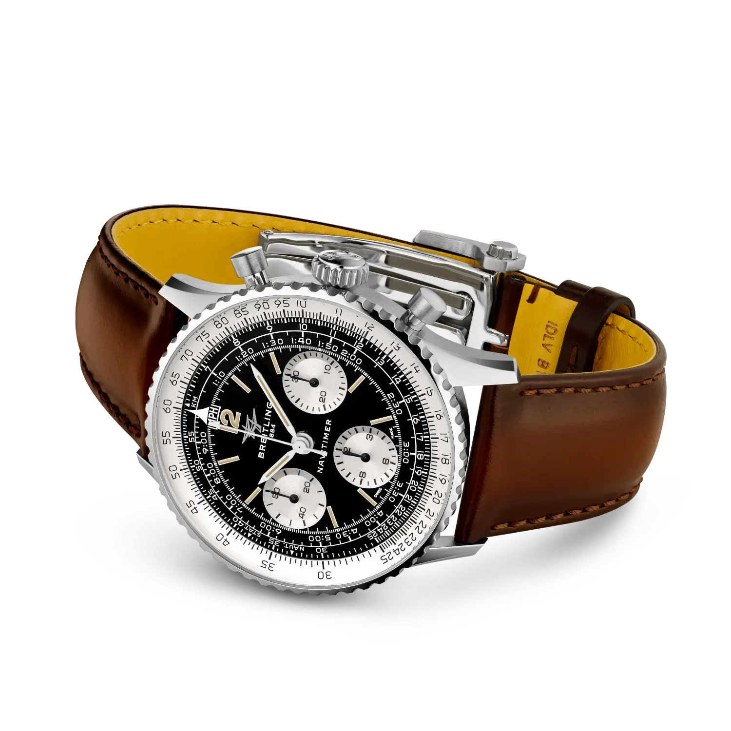 The gradient brown calf strap gives the black-and-cream dial a warmer 1960s frame.