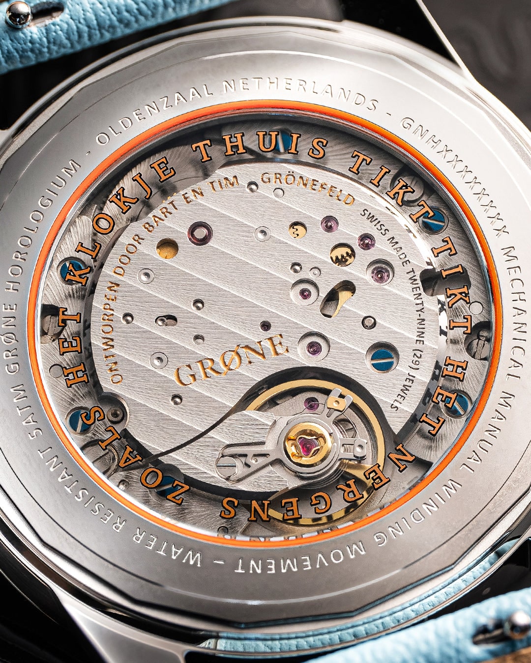 GRØNE Horologium Something Quirky caseback with Dutch inscription and orange gasket.