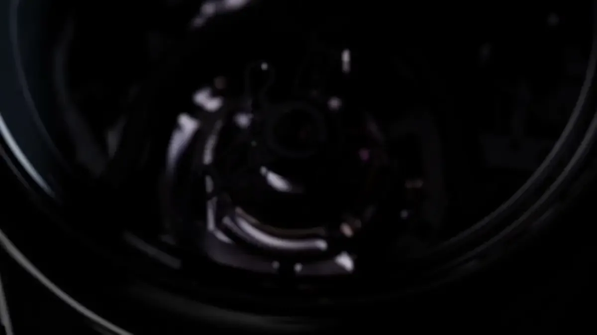 Official movement-side image showing the HMC 909 architecture and visible repeater/tourbillon layout.