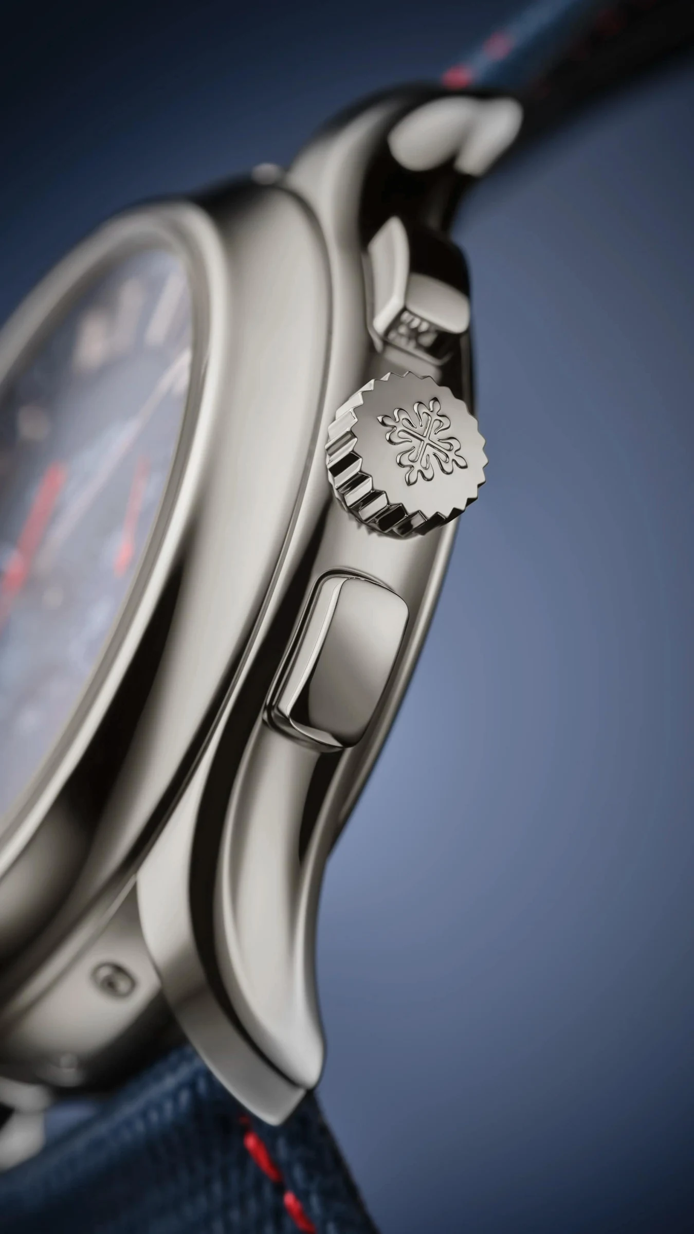 Side view of the Patek Philippe 5978P-010 platinum case and chronograph pushers